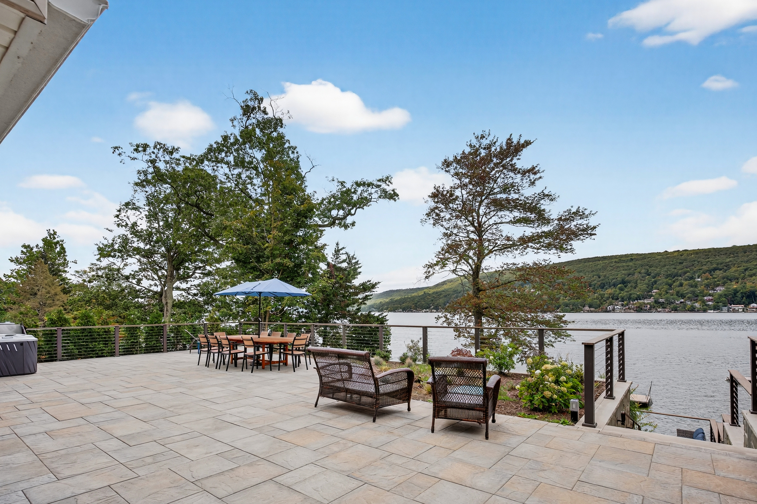multiple seating areas and large outdoor dining table